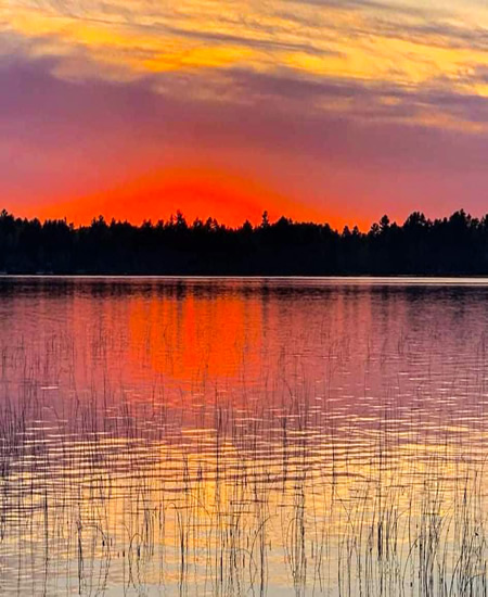 Beautiful summer sunset from Conro's Resort on Moen Lake.